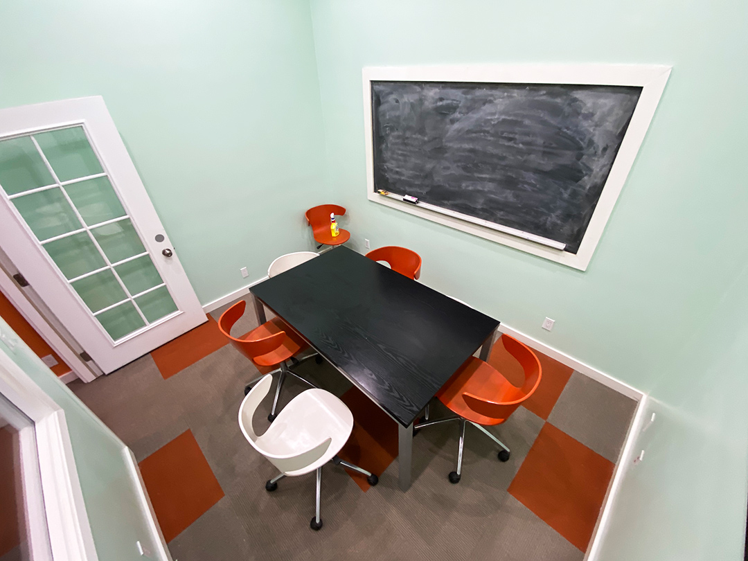 Feb. 8, 2020 | Valencia Apartments, San Luis Obispo | In a quiet study room at the back of the Valencia Apartment clubhouse, three friends spend their Saturday evening getting ready to use a Ouija board, a spiritualist device that is meant to allow people to communicate with the dead.